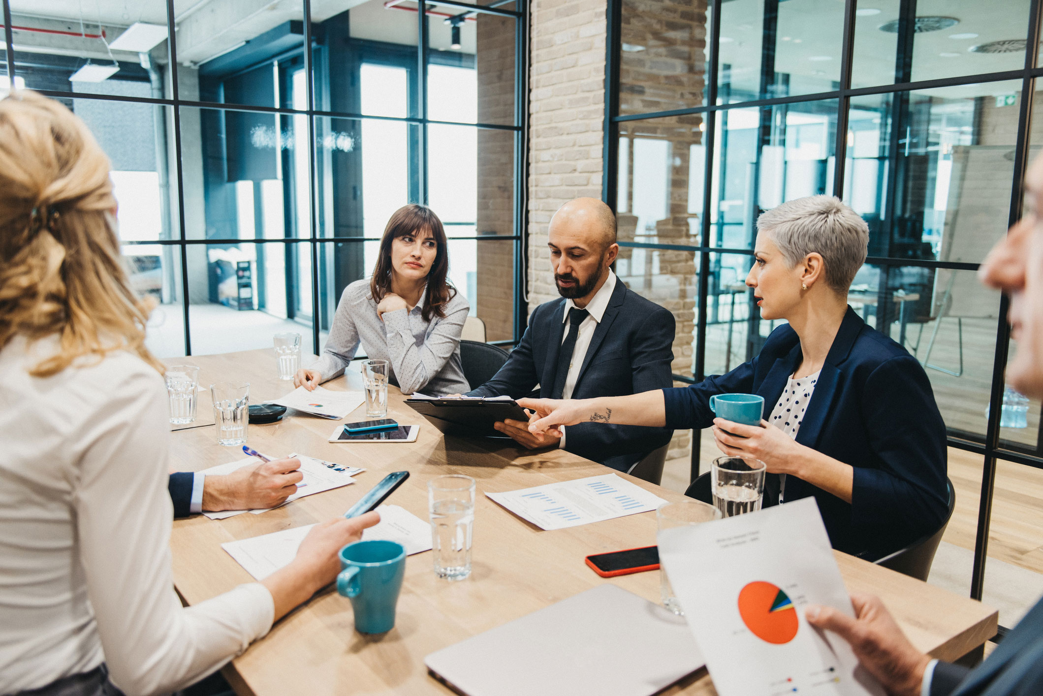 small group of people meeting in a conference room